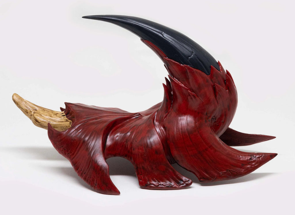 Rathalos Plate replica on its side in front of white background