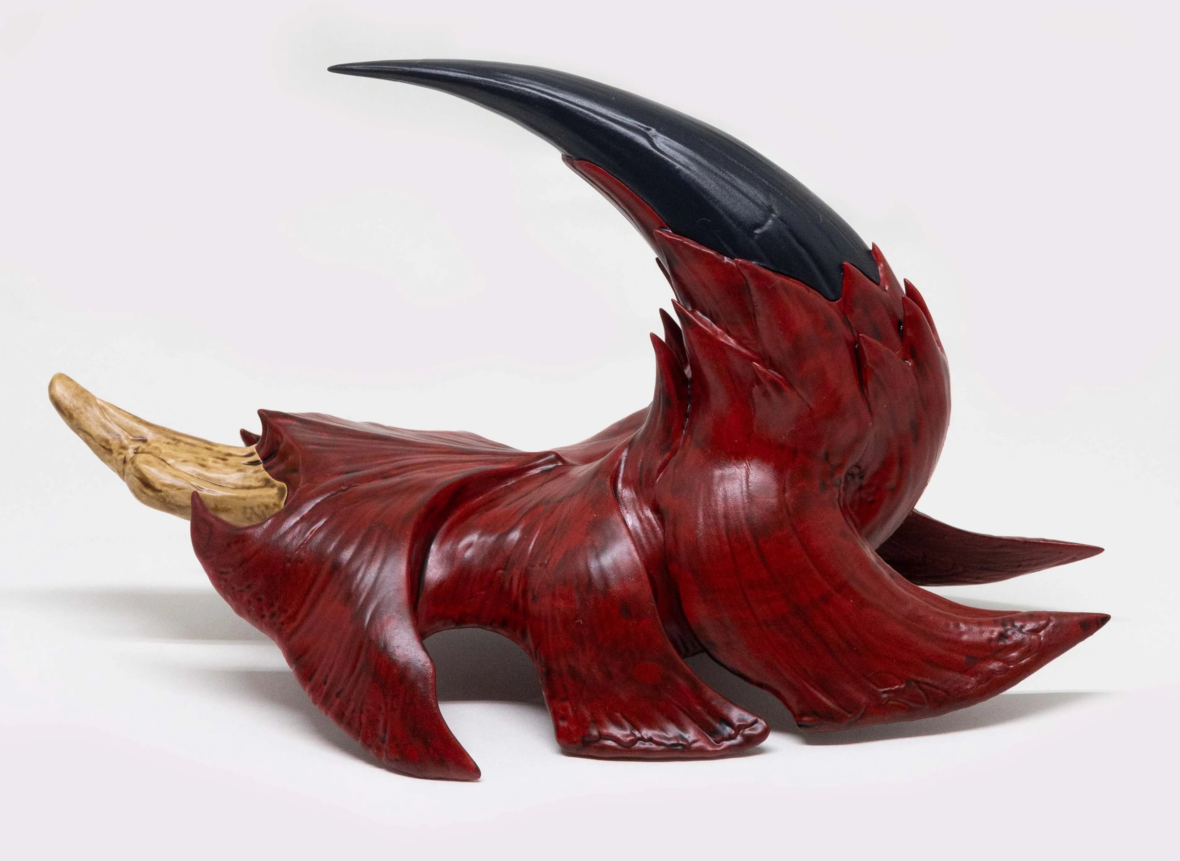 Rathalos Plate replica on its side in front of white background